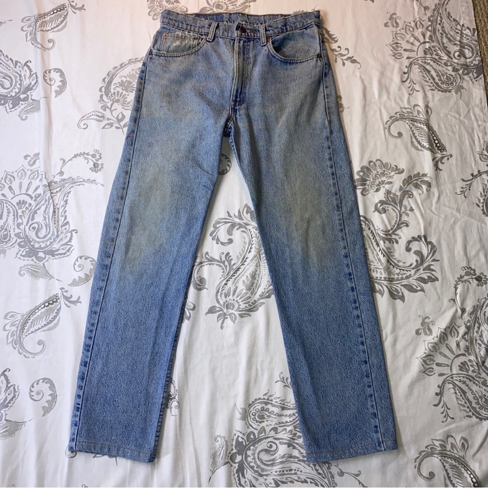 Vintage Levis 505 Made in USA Light
Wash Denim Jeans 32"‎ × 28 1/2"
Distressed